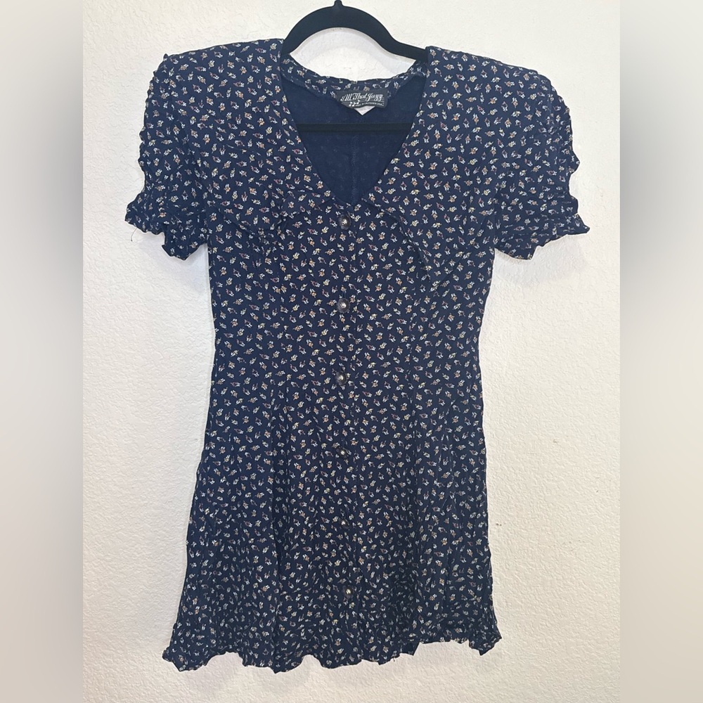 Vintage All That Jazz Blue Floral Dress
Made in the USA
Size 11/12
